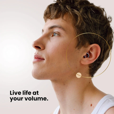 Person wearing Concert Ear Plugs With High Fidelity Hearing Protection And 18dB Noise Reduction, showing ear plug fit.