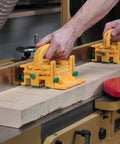 Person using Double Pack Pro Model GR-420 With Two Advanced GRR-Ripper Safety Tools And Handle Bridge Kits on wood slab