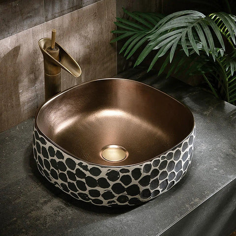 USZWBY Bathroom Vessel Sink 16.9 X 5.9 Inch Bathroom Sink Ceramic Vessel Sink with modern design and bronze finish.