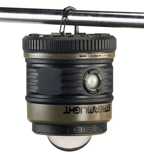 Siege 540 Lumen Compact LED Camping Lantern With 360 Degree Lighting And Red SOS Mode hanging by handle, durable coyote finish.