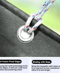 Close-up of Beefy Ultra Heavy Duty Tear Resistant Canvas Tarpaulin 10x12 Ft with 28 mil coating, grommets, and reinforced edges