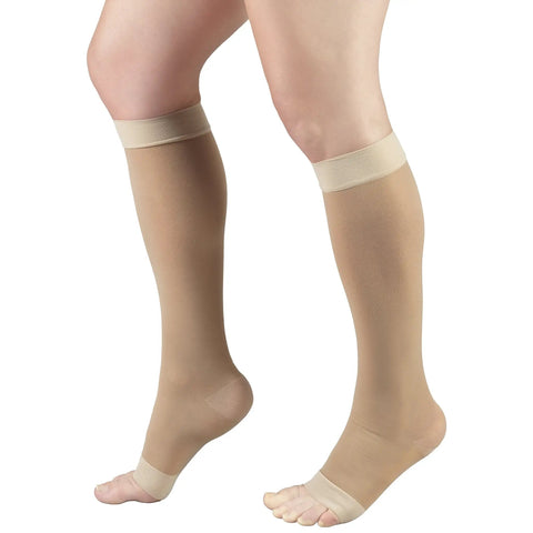 Womens Knee High Compression Stockings 15 To 20 Mmhg Sheer Nude Nylons 20 Denier Open Toe support hose shown on legs.