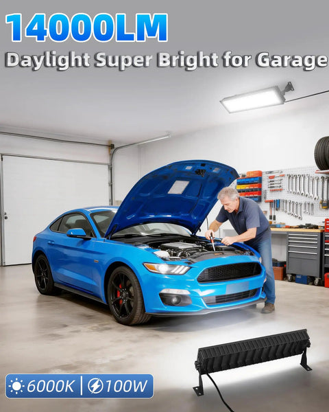 Mechanic working under Two Pack 100W LED Shop Lights 14000 Lumens 6000K Daylight Plug In Garage Lights in garage