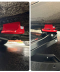 Grooved Pinch Weld Jack Pad With Magnetic Puck And Slotted Frame Rail Guard in use under vehicle, heavy duty red aluminum