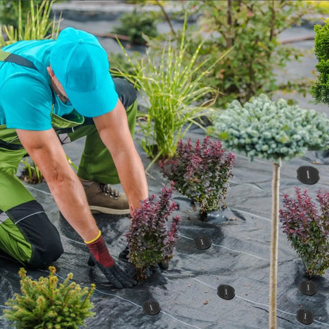 Gardener using 6 Inch Garden Stakes Kit With 100 Heavy Duty Staples, 100 Protective Gaskets, Pick Hook And Rubber Mallet