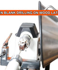 Heavy Duty 1/2 Inch Keyed Drill Chuck With Two Morse Taper Arbor in use on a wood lathe, drilling a pen blank.