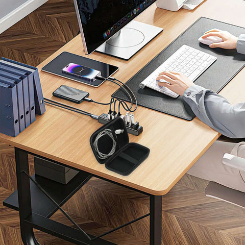 Legit Eva Hardshell Power Bank Case With Heavy Duty Zipper for Fast Chargers and Wireless Earbuds on a desk with cables.