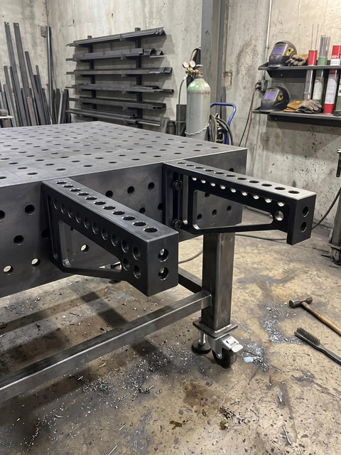 Built Tough 12 Inch Welding Clamping Square And Table Extension Kit Featuring Precision Machined 90 Degree Positioning Riser Blocks on metal table.