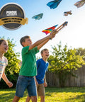 Paper Airplane Launcher STEM Kit For Kids Teens And Adults A Hands On Engineering Project That Lets You Build A Wooden Launcher In About 60 Minutes And Fly Custom Planes While Learning Science; kids launch paper planes outdoors