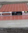 Waterproof IP65 Digital Level With Bright LED Display 24-Inch Pro Grade Electronic Level on pavement showing 2.50° reading