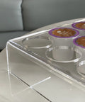 Close-up of Two Pack 35 Slot Flat Coffee Pod Organizer Tray In Clear Acrylic filled with K-Cup pods on countertop