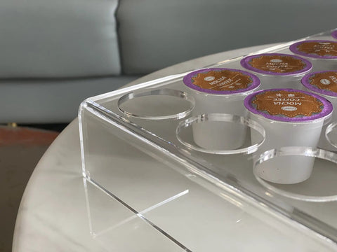 Close-up of Two Pack 35 Slot Flat Coffee Pod Organizer Tray In Clear Acrylic filled with K-Cup pods on countertop