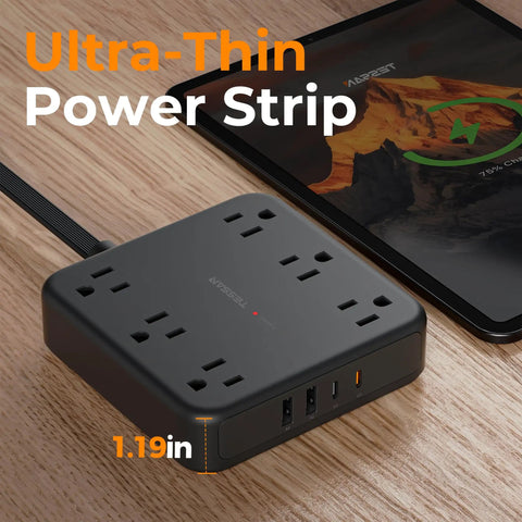 Heavy Duty Surge Protector Power Strip With An Incredibly Flat Plug 5 Foot Extension Cord In Black on wooden surface.