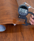 Measuring thickness of Walnut Wood Grain Peel And Stick Contact Paper Self Adhesive Vinyl Waterproof Removable Durable DIY Friendly For Old Furniture.
