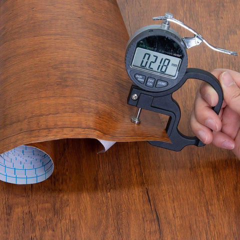 Measuring thickness of Walnut Wood Grain Peel And Stick Contact Paper Self Adhesive Vinyl Waterproof Removable Durable DIY Friendly For Old Furniture.