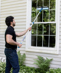 2 In 1 Squeegee And Scrubber Window Cleaning Tool With 14 Inch Blade And 8 Foot Connect And Clean Pole For Streak Free Glass Cleaning At Home Or Pro Jobs Microfiber Sleeve used on exterior window