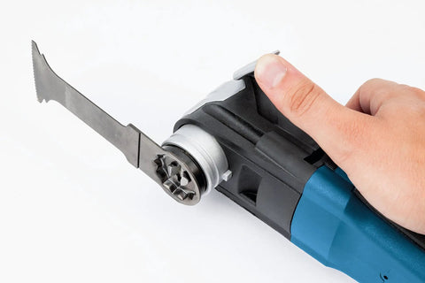 5 Piece Starlock Oscillating Multi Tool Blade Set For Metal Wood And General Materials with user holding a tool showing extension