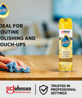 Pro Grade Furniture Polish Spray With Zesty Lemon Scent Bulk Six Pack Aerosol Cleaner For Sealed Wood And Hard Surfaces Killer Shine Work Ready Formula For Everyday Hustle Clean being used on a wooden table.