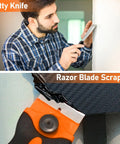 Person using putty knife on wall, orange razor blade scraper on fabric surface