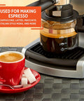 4 Cup Glass Replacement Carafe With Black Handle For Espresso Coffee Makers Clear See Through Viewing Carafe Lets You Monitor Your Brew Durable Replacement Glass Jug For Home Kitchens is used to make espresso on a coffee maker with a red cup on the side.