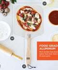 OUII aluminum pizza peel with wooden handle, 12x14 inch; front view showing pizza on peel.