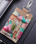 Slim PU Leather Key Wallet For Men And Women, camping RV design, metal keychain, on grey surface
