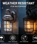 Industrial Outdoor Wall Light Fixtures Set Of 2 With Water Ripple Glass glowing in snowy weather at night