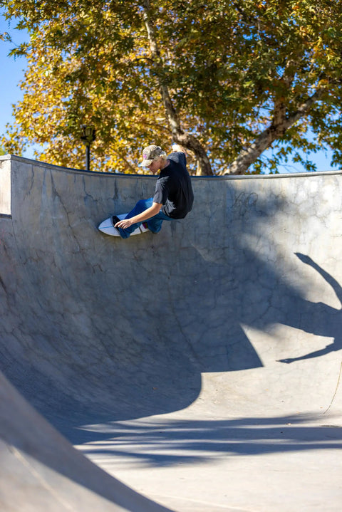 Child riding a skatepark bowl with RipStik RipSurf Caster Board For Street Surfing With Traction Pad And Durable Poly Deck Two High Performance Wheels 10.5 Inch Deck CMYK Finish Built To Ride Like Waves On Pavement.