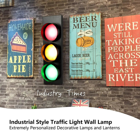 Traffic Light Wall Lamp With Remote Control, Retro LED Stop Light Decor alongside vintage art on brick wall