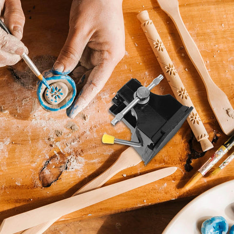 Mini Bench Vise Clamp With Suction Base For Carving And Micro Sculptures, surrounded by carved tools and hands working on craft