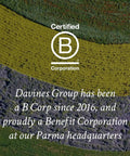 Aerial view of colorful fields with the 'Certified B Corporation' logo and text about Davines Group's certification.