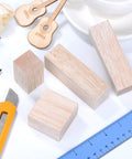 12 Pcs Balsa Wood Blocks For Carving Kit With 4 Sizes For Whittling And Craft Projects Unfinished Wood Blocks on a table
