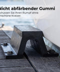 Beefed-Up Rubber Dock Protector With Arch Bolt-Down Mount securing a wooden dock, beside a boat, showing weatherproof marine shield.
