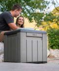 Versatile Outdoor Storage Cube Deck Box Doubles As Cozy Bench Seat And 25 Gallon Capacity Weather Resistant Patio Organizer on outdoor patio.