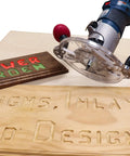 Dead Nuts Universal Compact Router Sub Base Quick Adjust Plate in use for woodworking with engraved signs and trim router.