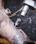 Heavy Duty Tap And Die Set With Guide Bolt Short Profile Rig for Exhaust Nox and Dpf Sensor Threads in use on engine.