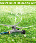 Heavy Duty Metal Rotary Lawn Sprinkler With 3 Arm Automatic Revolving Whirl And Wheeled Base Chainable in operation on grass.