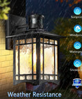 Two Pack Motion Sensor Outdoor Wall Lights With Dusk To Dawn Led Exterior Fixtures Anti Rust Waterproof Black Porch Sconce displayed in rain