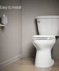 Cimarron Left Hand Trip Lever For Comfort Height Toilets In Vibrant Polished Nickel Finish shown on white toilet in bathroom