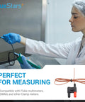 Technician using Type K Thermocouple Bead Probe with clamp meter for precise temperature measurement in lab setting.