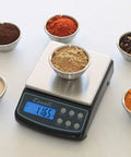 Six Measurement Units High Precision Lab Scale Pro Grade 600g Capacity With 0.01g Resolution Tare Hold Auto Shut Off displaying 1.65g