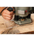 Using Straight Up Butterfly Router Inlay Template Machined From Thick Clear Acrylic with plunge router on wood surface.