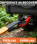 Tigertooth Three Quarter Inch D Ring Shackles With Seven Eighths Inch Pin attached to tow strap on off-road vehicle, red color