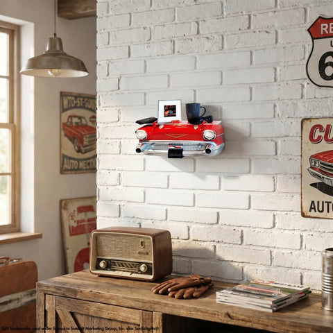 Room with 1957 Chevrolet Bel Air Floating Wall Shelf With LED Headlights, displaying items on a white brick wall.
