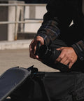 Man attaching 58mm UV Haze Lens Filter for DSLR and Mirrorless Cameras protects your lens reduces glare flare and ghosting