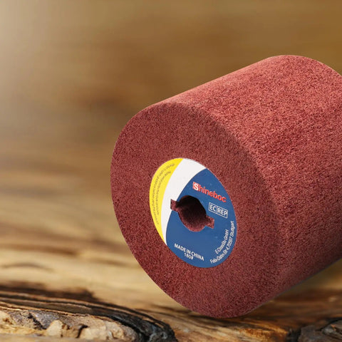 Nonwoven Flap Wheel for Surface Conditioning 120 Grit Drum 120 x 100 x 19 mm on a wooden surface