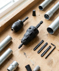 Drill Compatible Conduit Reaming Kit With One Quarter Inch Shank Pipe Reamer And Five Replacement Blades on wooden surface
