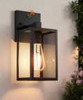 Dusk To Dawn Outdoor Wall Light With Automatic Sensor Solid Black Metal Coach Lantern Waterproof Porch Fixture mounted with clear bulb.