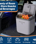 Ride Along Thermoelectric Car Cooler And Warmer 32 Qt Fits A Six Pack Perfect For Weekend Drives with snacks and drinks in a car.