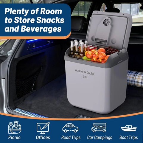 Ride Along Thermoelectric Car Cooler And Warmer 32 Qt Fits A Six Pack Perfect For Weekend Drives with snacks and drinks in a car.